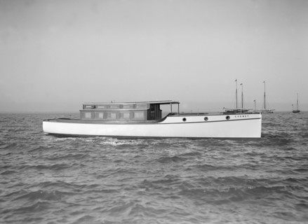 The motor launch 'Cygnet' under way, 1912. Creator: Kirk & Sons of Cowes.