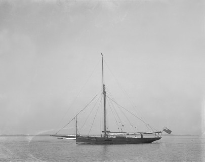 The cutter 'Cymberline' under way by motor. Creator: Kirk & Sons of Cowes.