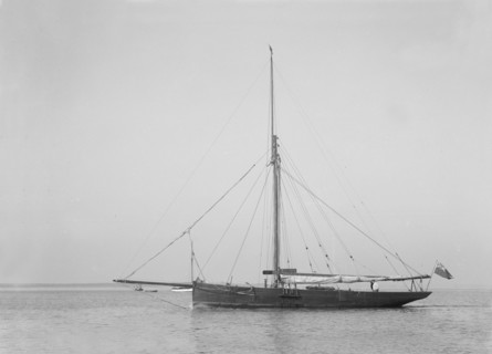 The cutter 'Cymberline' under way by motor. Creator: Kirk & Sons of Cowes.