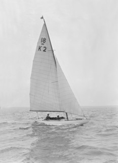 The 18-foot keelboat 'Prudence' (K2) under sail, 1922. Creator: Kirk & Sons of Cowes.