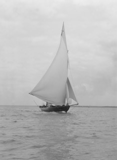 The 32 metre ketch 'Joyette' running downwind, 1922. Creator: Kirk & Sons of Cowes.