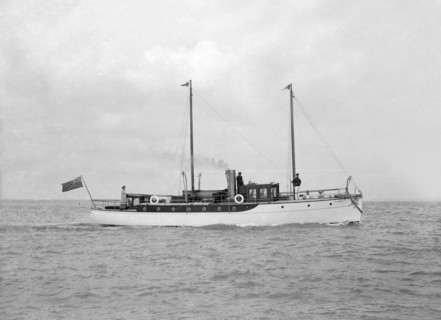 The 23 ton motor yacht 'Kiwi' under way, 1914. Creator: Kirk & Sons of Cowes.