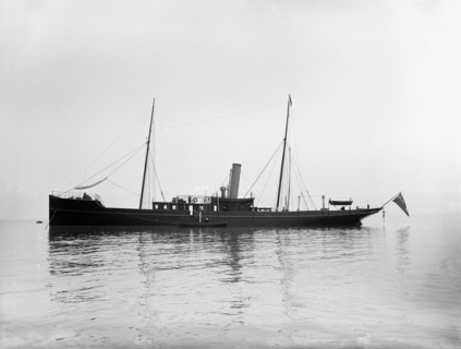 The 116 ton steam yacht 'Athena' at anchor, 1911. Creator: Kirk & Sons of Cowes.
