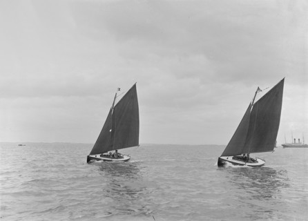 Hamble River Class dinghies racing close-hauled, 1921. Creator: Kirk & Sons of Cowes.