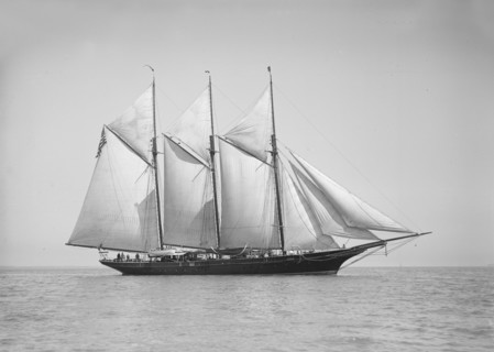 The three-mast auxiliary schooner 'Invincible', 1911. Creator: Kirk & Sons of Cowes.
