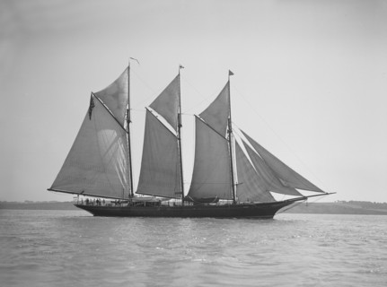 The three-mast auxiliary schooner 'Invincible', 1911. Creator: Kirk & Sons of Cowes.