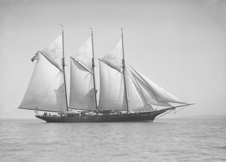 The three-mast auxiliary schooner 'Invincible', 1911. Creator: Kirk & Sons of Cowes.