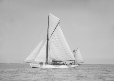 The yawl 'Suzanne' under sail, 1911. Creator: Kirk & Sons of Cowes.