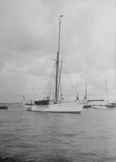 The cutter 'Yolande' at anchor, 1912. Creator: Kirk & Sons of Cowes.