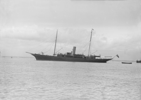The steam yacht 'Maid of Honour' at anchor. Creator: Kirk & Sons of Cowes.