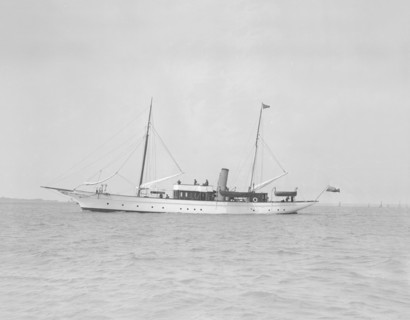 The steam yacht 'Titania' under way, 1911. Creator: Kirk & Sons of Cowes.
