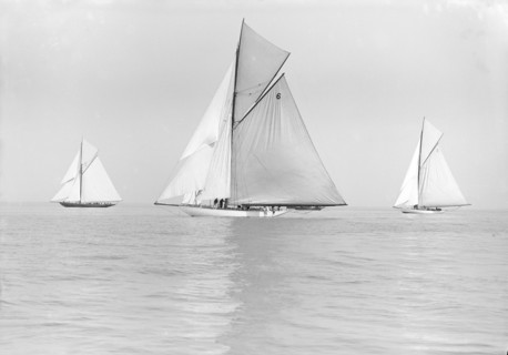 The Big Class yachts 'Britannia', 'Ma'oona', and 'Carina' sailing in light winds, 1913. Creator: Kirk & Sons of Cowes.