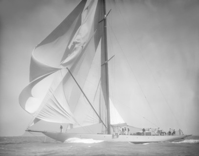 Spinnaker flying on unknown yacht. Creator: Kirk & Sons of Cowes.