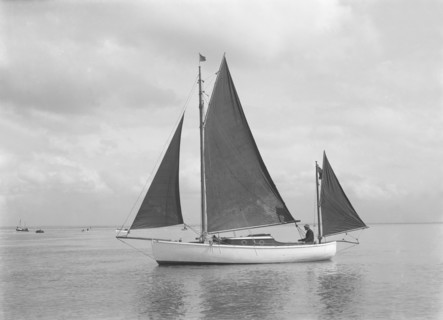 The 4 ton yawl 'Mandy' under sail, 1922. Creator: Kirk & Sons of Cowes.