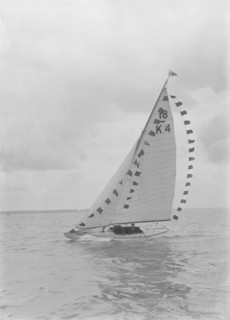 Saling yacht 'Asphodel' (K5) with prize flags, 1922. Creator: Kirk & Sons of Cowes.
