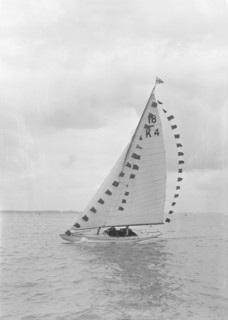 Saling yacht 'Asphodel' (K5) with prize flags, 1922. Creator: Kirk & Sons of Cowes.
