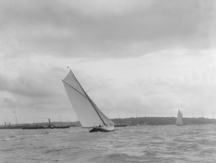 Cutter heeling hard on upwind leg. Creator: Kirk & Sons of Cowes.