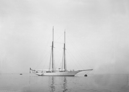 Schooner at anchor. Creator: Kirk & Sons of Cowes.