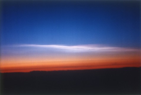 Clouds 39,000 feet north of Stavanger, Norway, seen from DC-8 plane. Creator: NASA.
