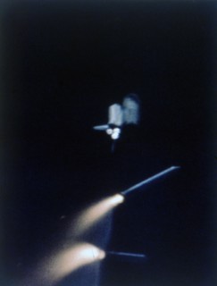 Solid rocket booster separates, first Space Shuttle flight, 12 April 1981. Creator: NASA.