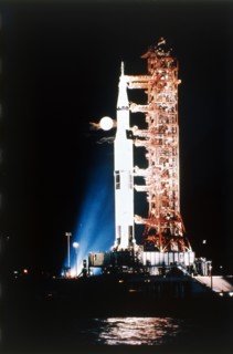 Apollo 9 Saturn V rocket with full moon, 1969.  Creator: NASA.