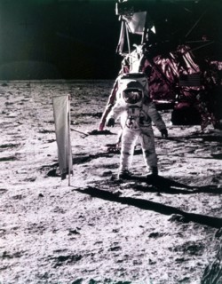 Buzz Aldrin deploys solar wind collector on the surface of the Moon, Apollo 11 mission, July 1969.  Creator: Neil Armstrong.