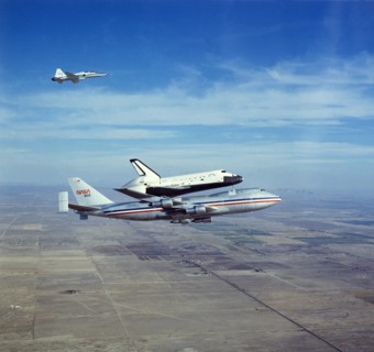 Space Shuttle Orbiter 'Columbia' on Boeing 747 Shuttle Carrier, 1980s. Creator: NASA.