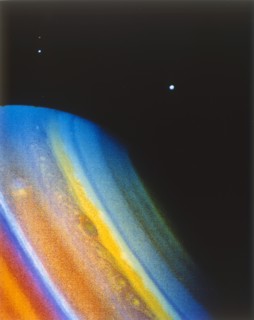 Saturn and its moon Dione, seen from the Voyager 2 spacecraft. Creator: NASA.