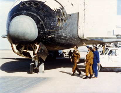 Inspecting heat tiles, second Space Shuttle flight, November 1981. Creator: NASA.