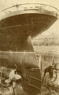 At Work on the Stern of the "Mauretania", in Dry Dock', c1930.
