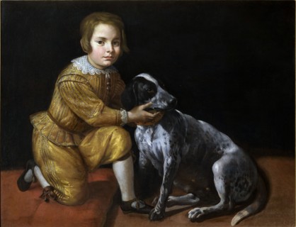 Portrait of a boy with a dog.