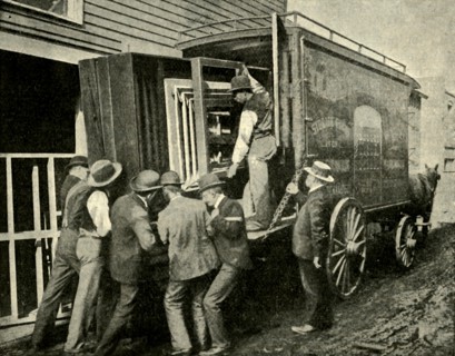 Loading The Camera On A Van For Removal', 1901.