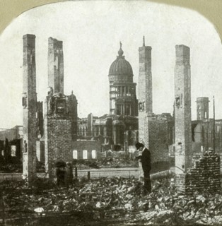 City Hall - Photographer in foreground - Tall brick chimneys left standing', .