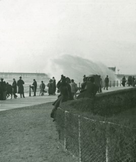 Rough sea over the promenade at Hastings, Sussex, late 19th-early 20th century.
