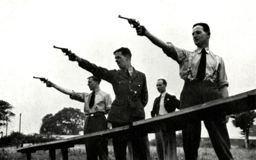 'Revolver practice at the Elementary Flying Training School',1941