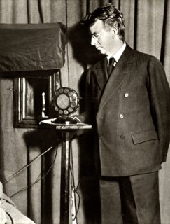 John Logie Baird watching the first play to be televised, 14 July 1930