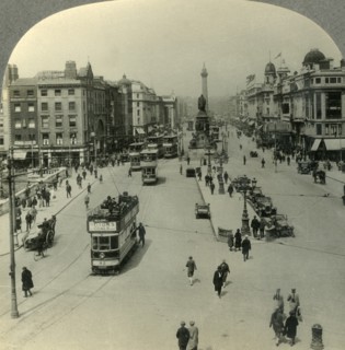 'The O'Connell Monument and the Nelson Pillar, O'Connell Street, Dublin, Ireland', c1930s. Creator: Unknown.