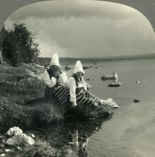 'Lake Siljan Mirrors the Past in the Life of the Present. Rattvik Costumes in Dalecarlia, Sweden', c Creator: Unknown.