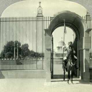 'Through a Sentry-guarded Gateway to the Beautiful Government Buildings of New Delhi', c1930s. Creator: Unknown.