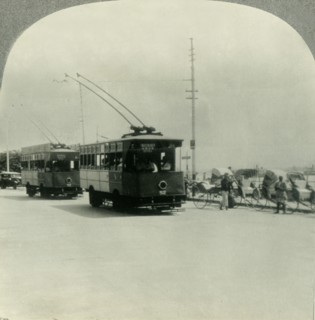 'Trackless Tram Cars in Singapore, Straits Settlement, British Malaya', c1930s. Creator: Unknown.
