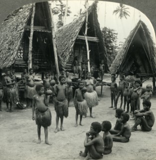 'Carrying Water in Coconut Shells - A Village Scene in New Guinea', c1930s. Creator: Unknown.