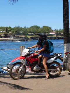 Woman and child on Honda motorcycle, Chile 2019. Creator: Unknown.