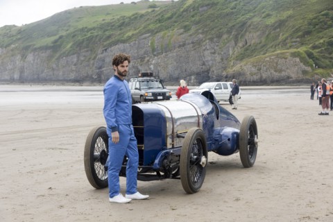 1925 Sunbeam 350 hp at Pendine Sands 2015 with model in costume. Creator: Unknown.