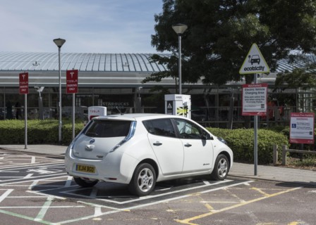 Nissan Leaf at elctric charging point 2015. Creator: Unknown.