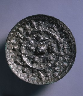 Animal-and-Grape Mirror with a Variety of Birds, late 600s. Creator: Unknown.