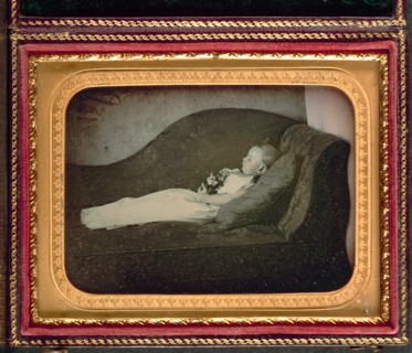 Dead Child On a Sofa, c. 1855. Creator: Unidentified Photographer.