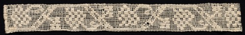 Fragment of a Band with Geometric Pattern and Floral Motif, 19th century. Creator: Unknown.