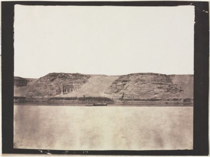 General View of Monuments Carved into Bedrock with Photographer's Dahabieh. Abu Simbel, 1851-1852. Creator: Félix Teynard (French, 1817-1892).