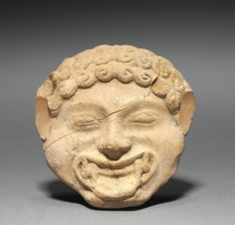 Gorgon Plaque with Incised Figure of a Dancing Satyr, c. 525-475 BC. Creator: Unknown.