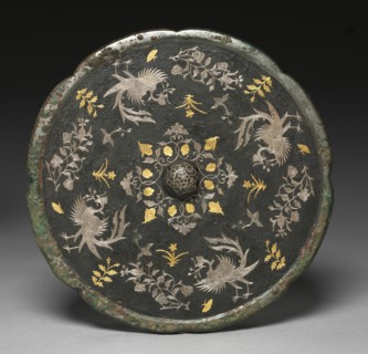 Mirror with Phoenixes, Birds, Butterflies, and Floral Sprays, 700s. Creator: Unknown.